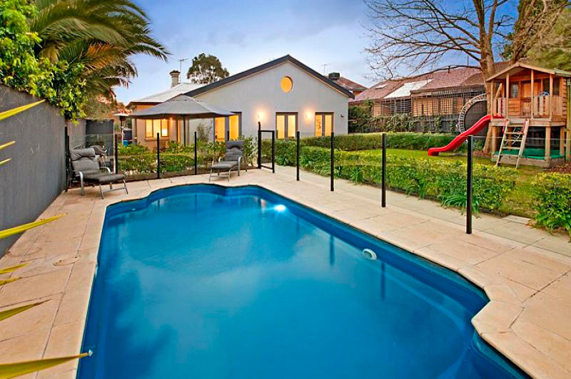 Renvovated home in Brighton East. Image taken from swimming pool looking over garden and home.