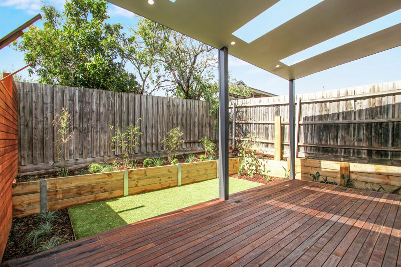 Master bedroom on the middle level of the Mordialloc custom home