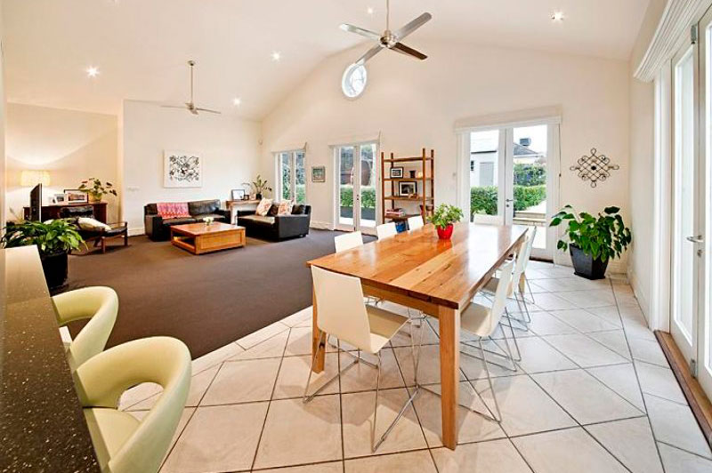 Living area opening to the outdoor entertaining space in Brighton East